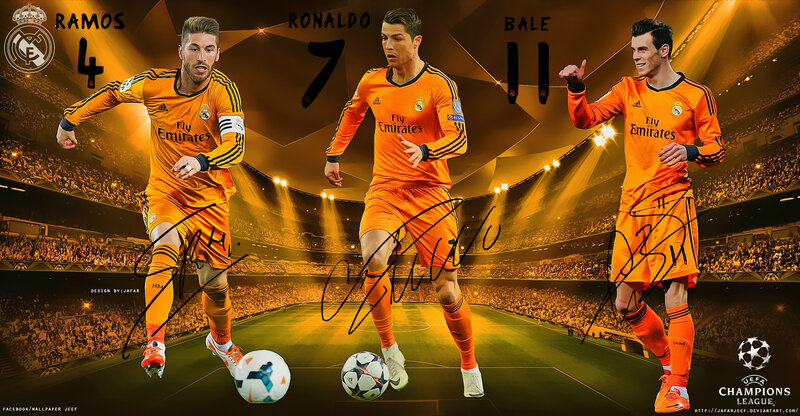 Three Soccer Players on Field — Orange