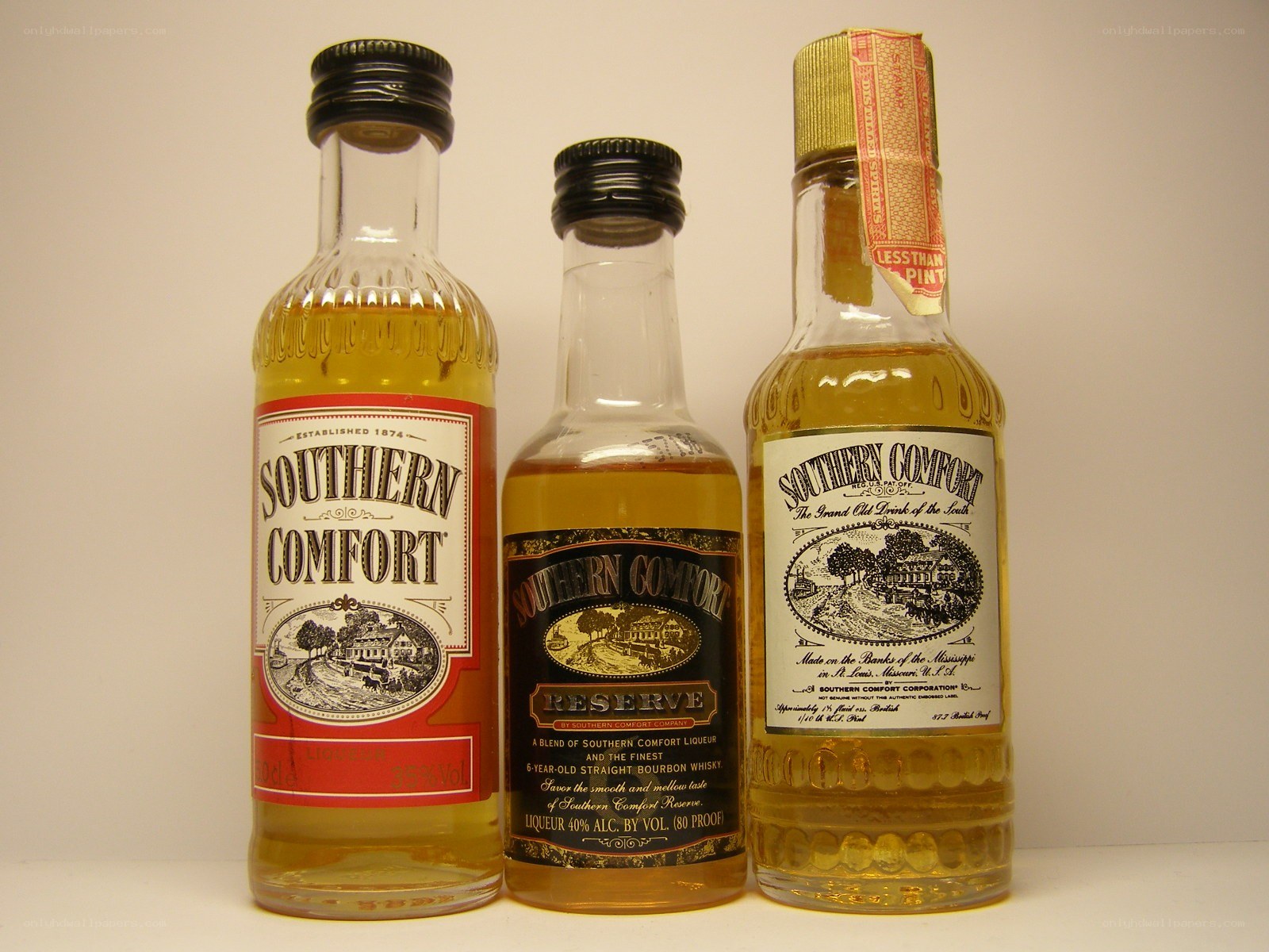 Three Southern Comfort bottles