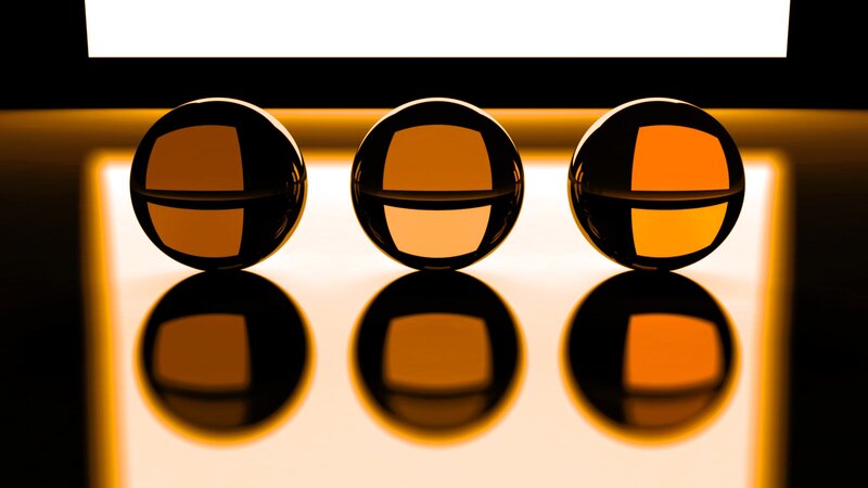 Three Spheres on Reflective Surface — Black
