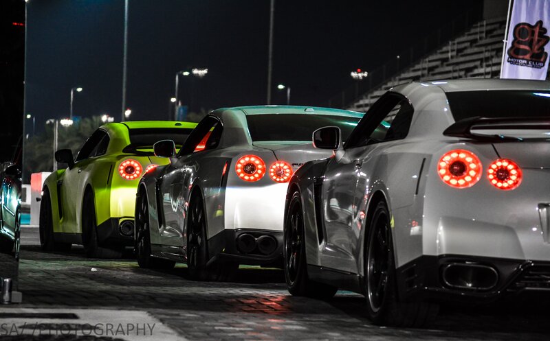 Three Sports Cars at Night — White