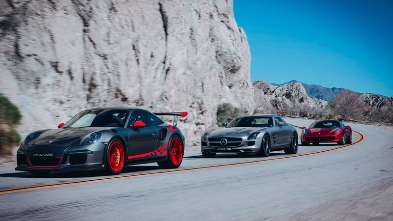 Three Sports Cars on Road — Gray