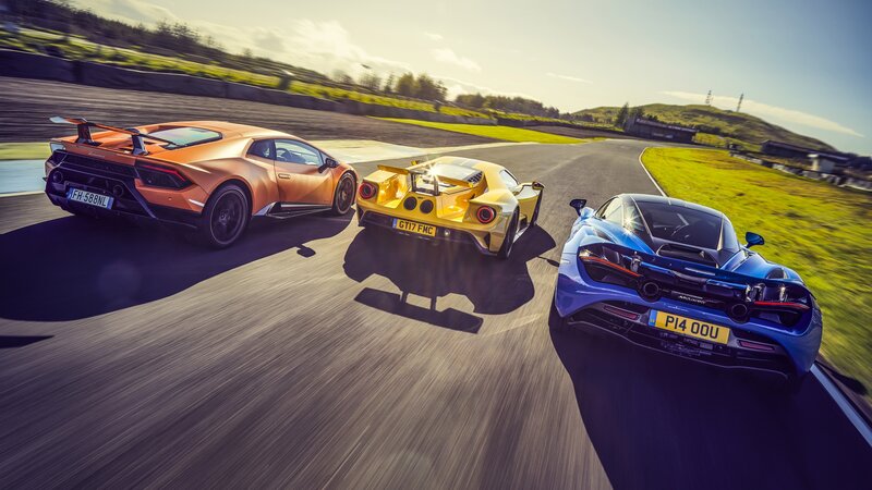 Three Sports Cars on Track — Orange