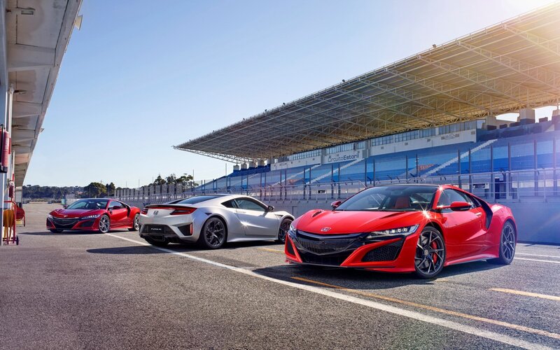 Three Sports Cars on Track — Red