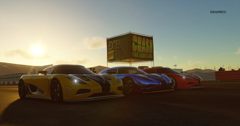 Three Sports Cars on Track — Yellow, Dramatic