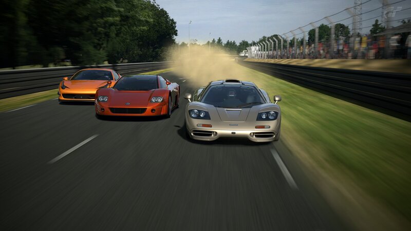 Three Sports Cars Racing