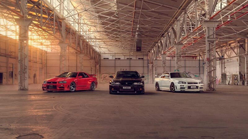 Three Sports Cars — Red, Dramatic, Sunset