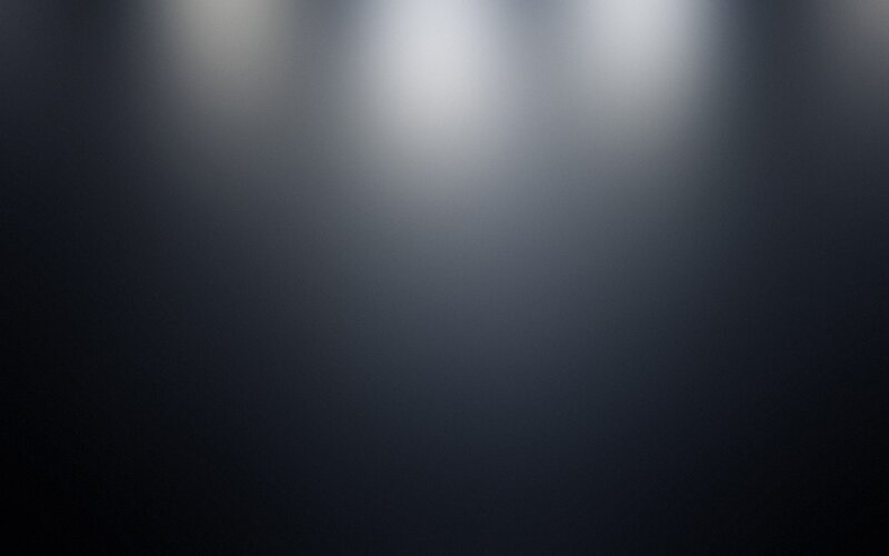 Three Spotlights on Dark Wall