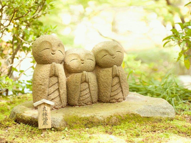 Three Stone Statues