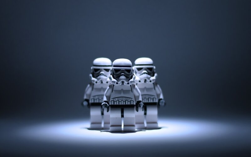 Three Stormtrooper Figures — White, Dramatic