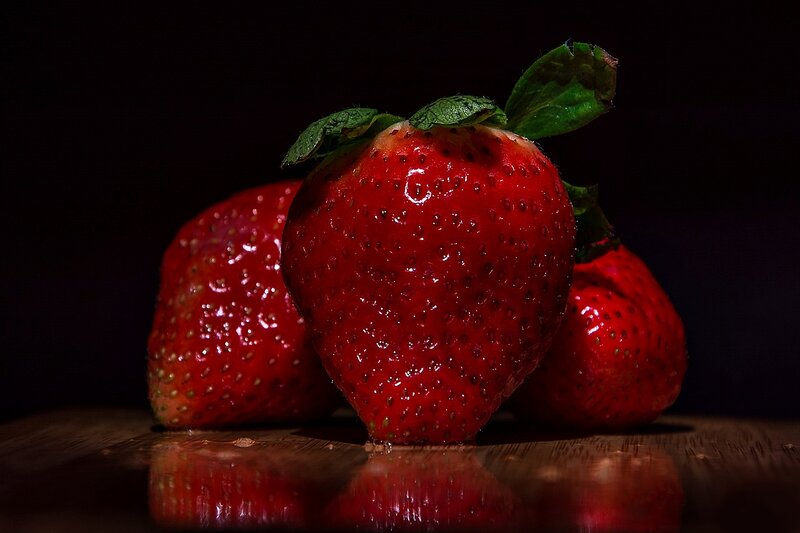 Three Strawberries on Wood — Red