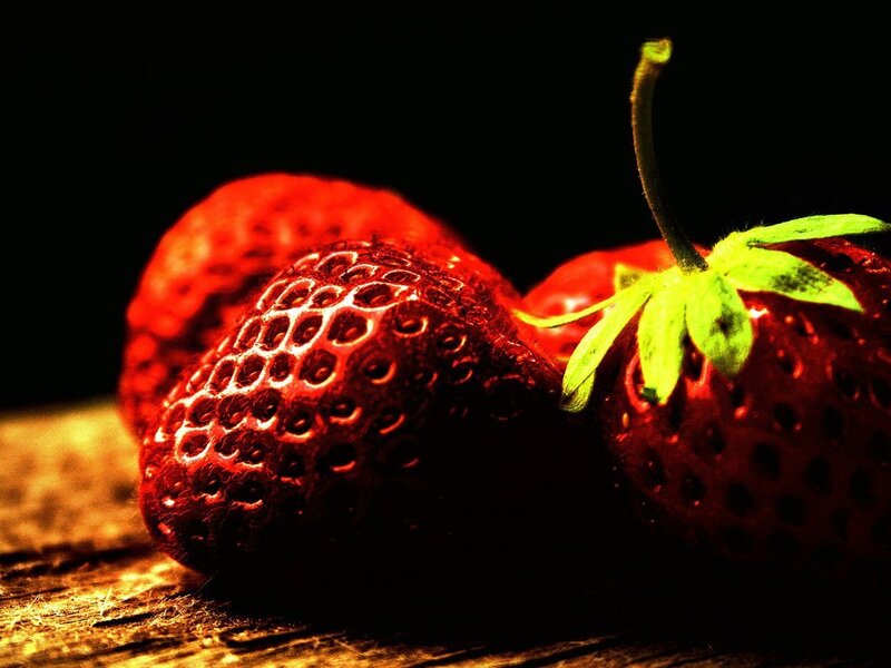 Three Strawberries on Wood