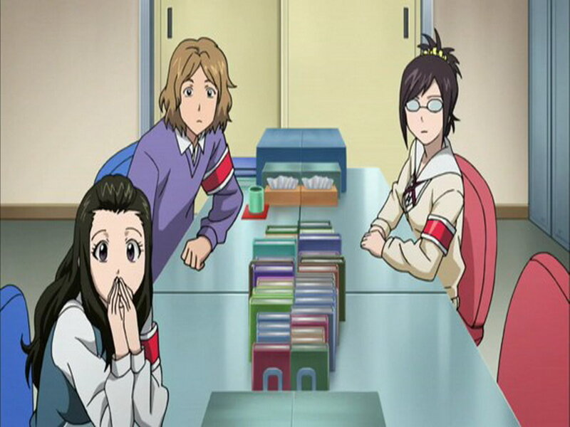 Three Students at a Table
