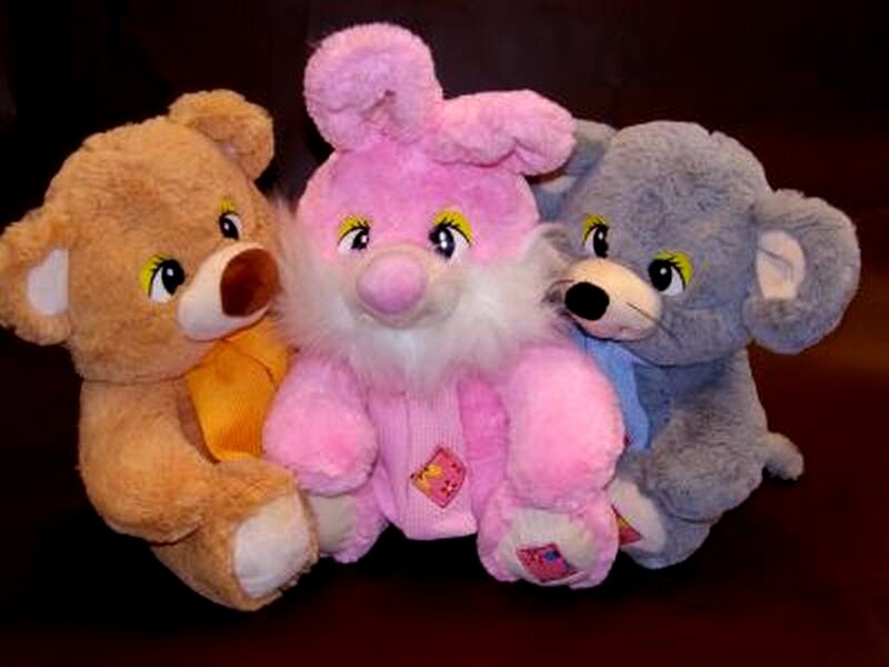 three stuffed animals together