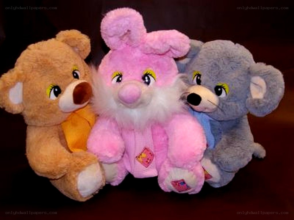 three stuffed animals together