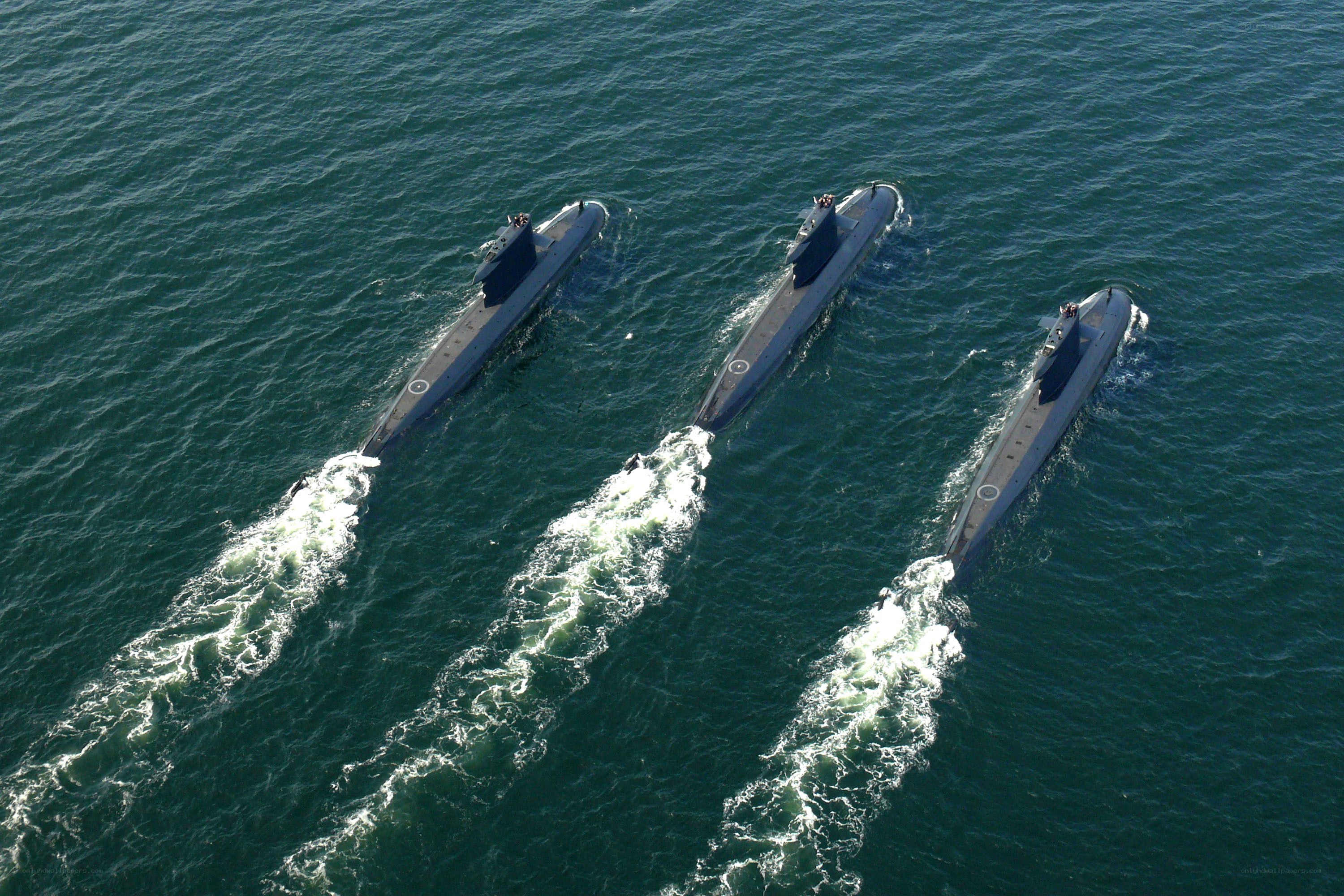 Three submarines at sea
