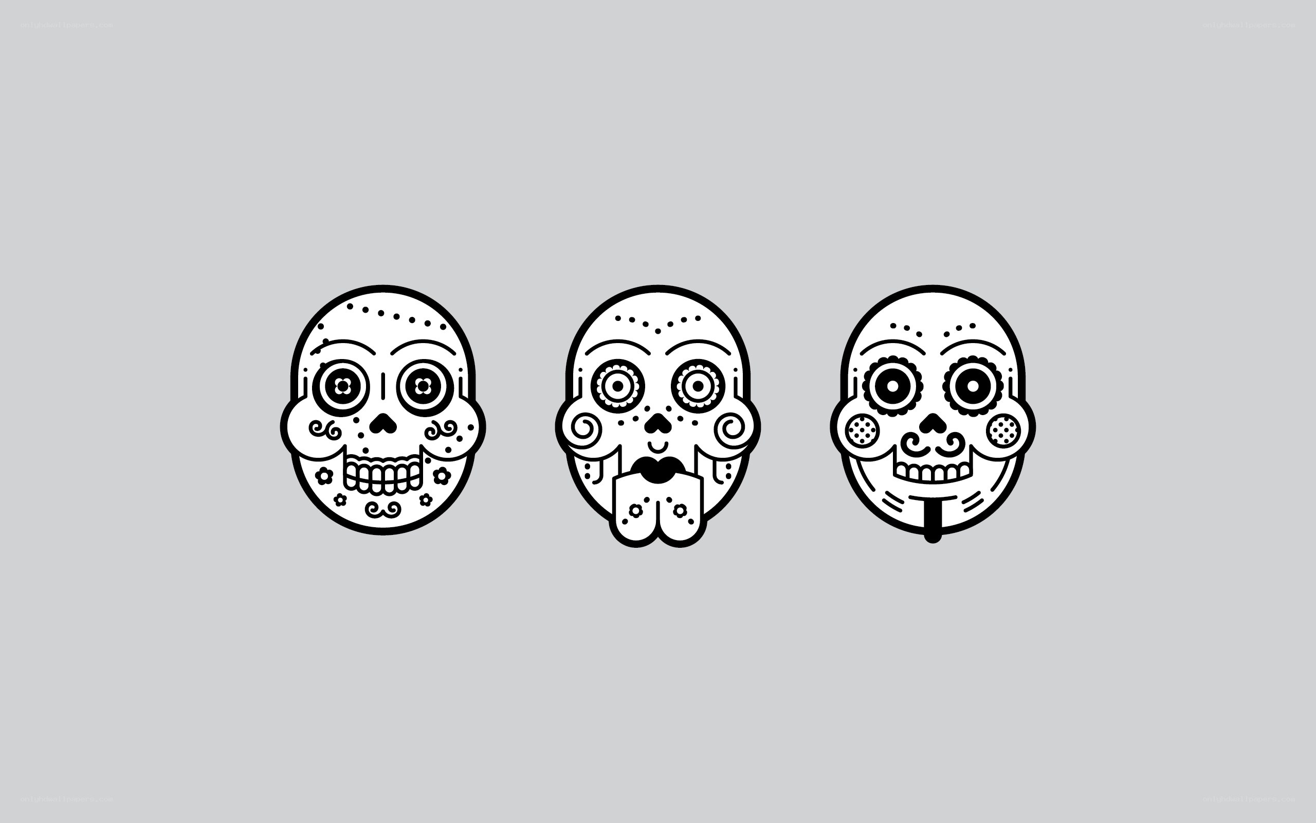 three sugar skull designs
