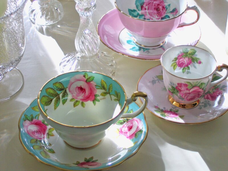 Three Teacups on Saucers