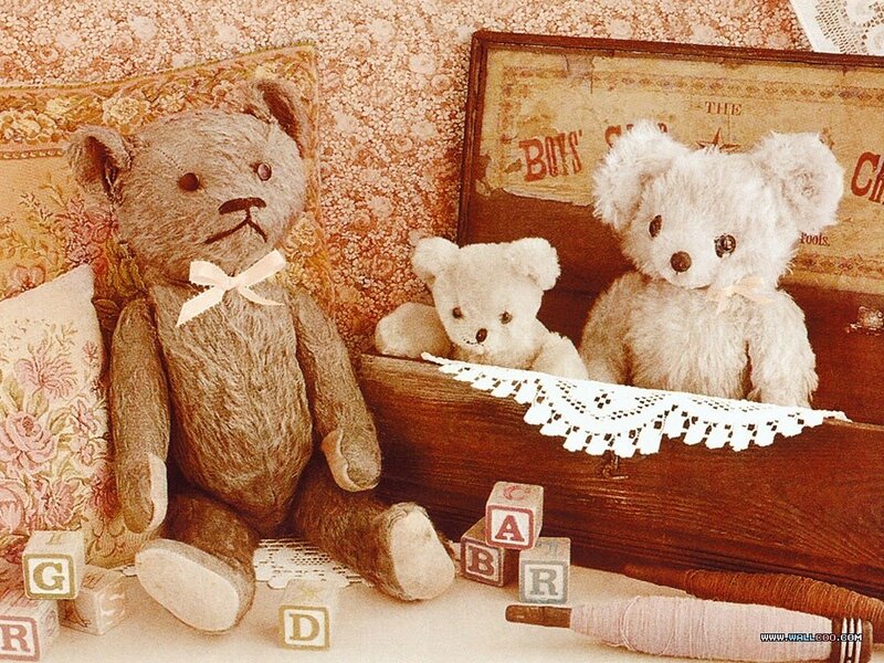 Three Teddy Bears in a Box