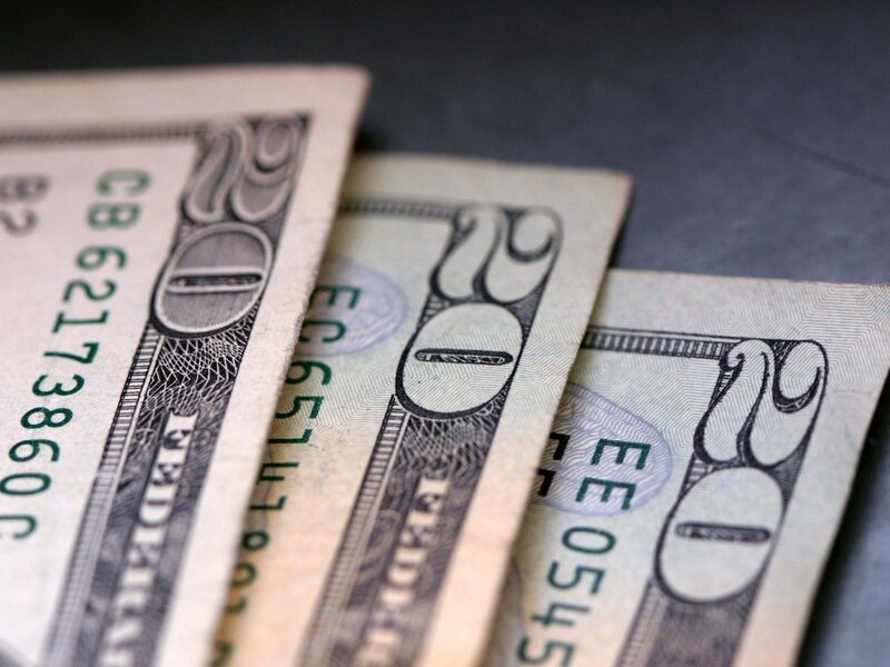 three ten-dollar bills