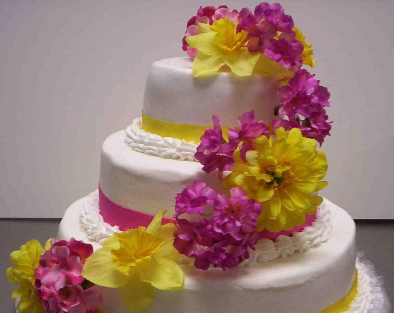 three-tiered floral wedding cake