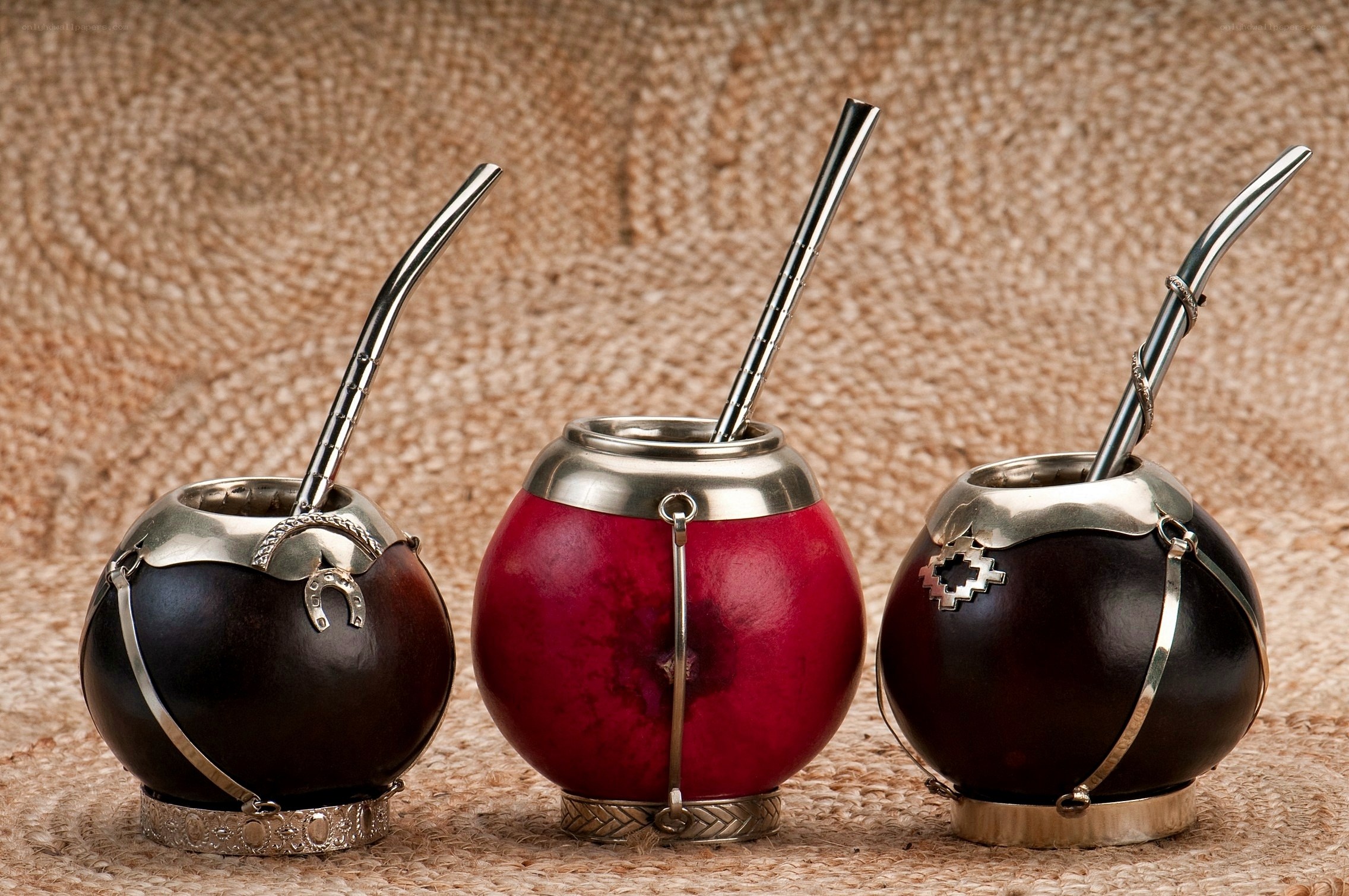 Three traditional mate gourds