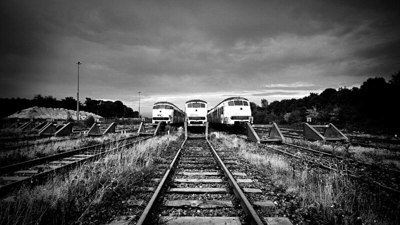 Three Trains on Tracks — Black