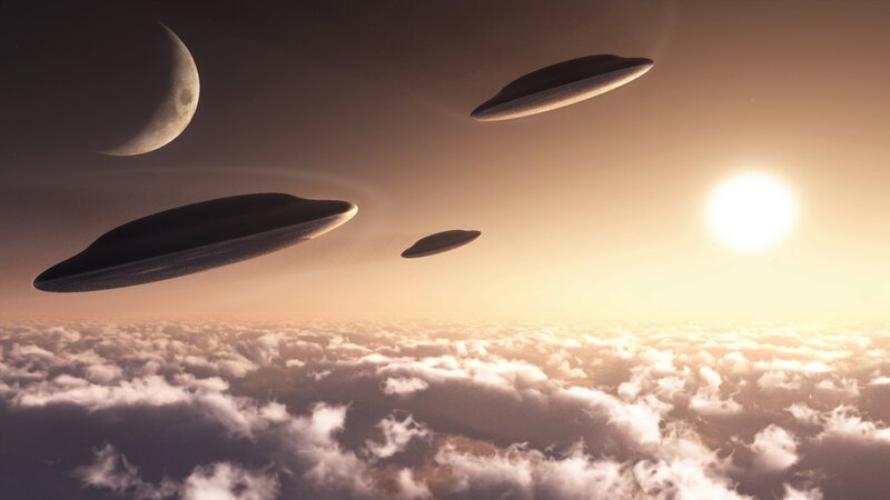 Three UFOs Above Clouds