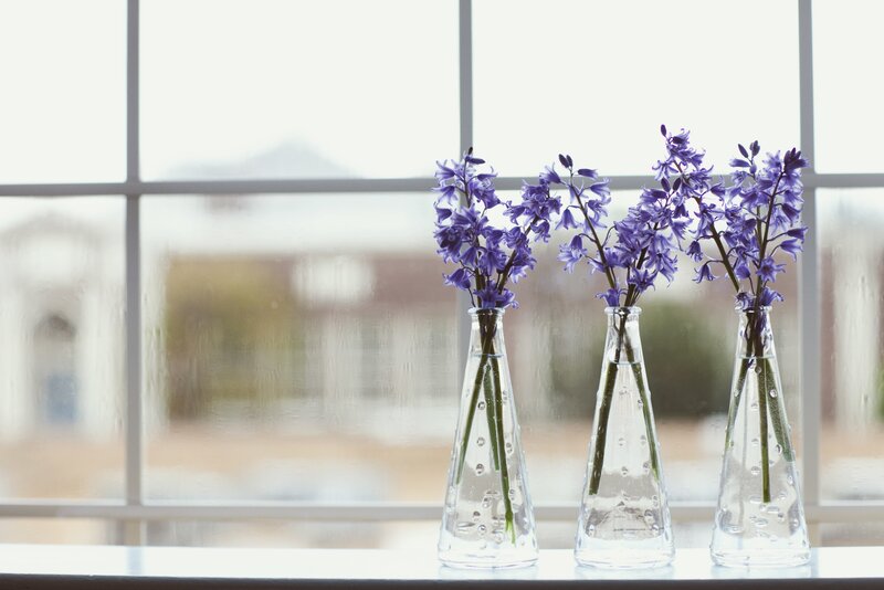 Three Vases with Purple Flowers
