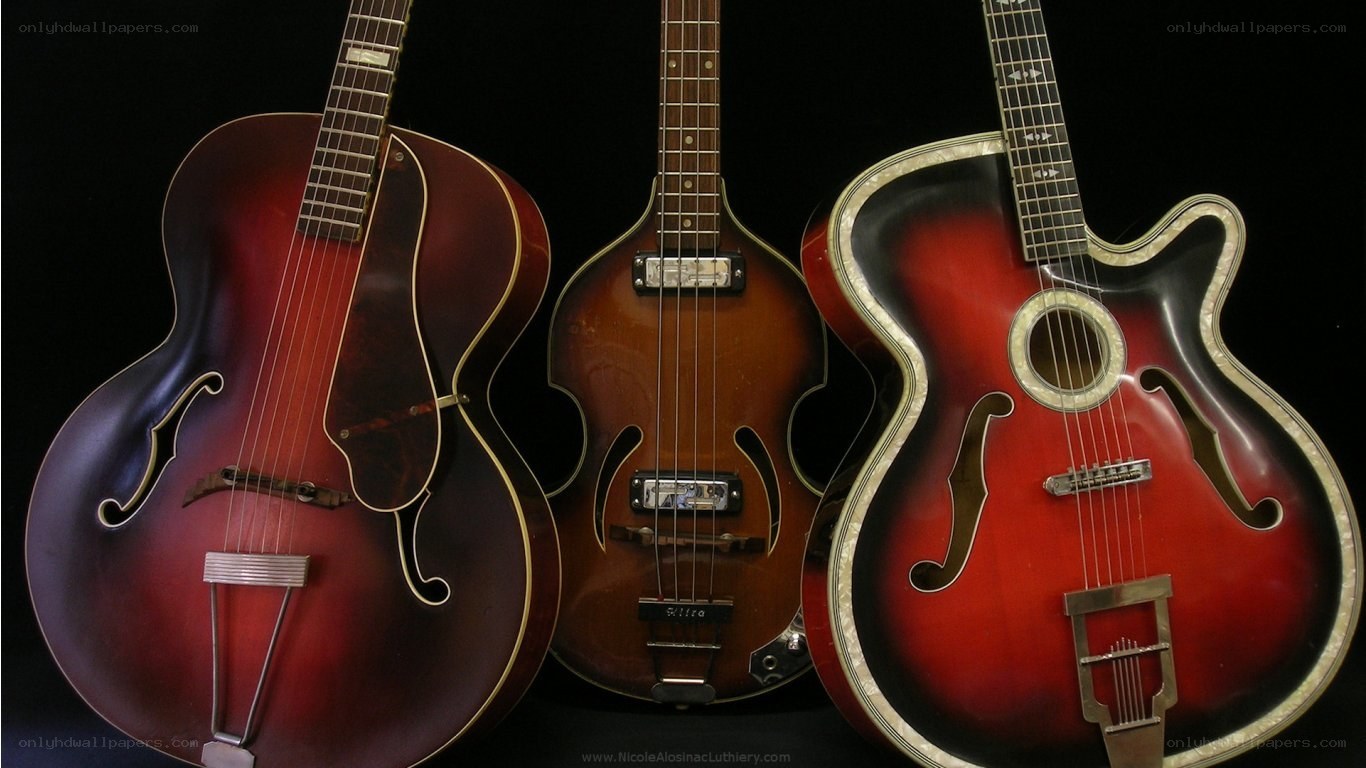 Three vintage archtop guitars