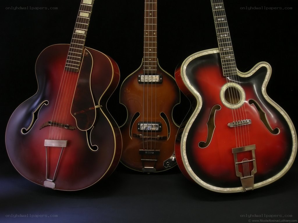 Three vintage archtop guitars