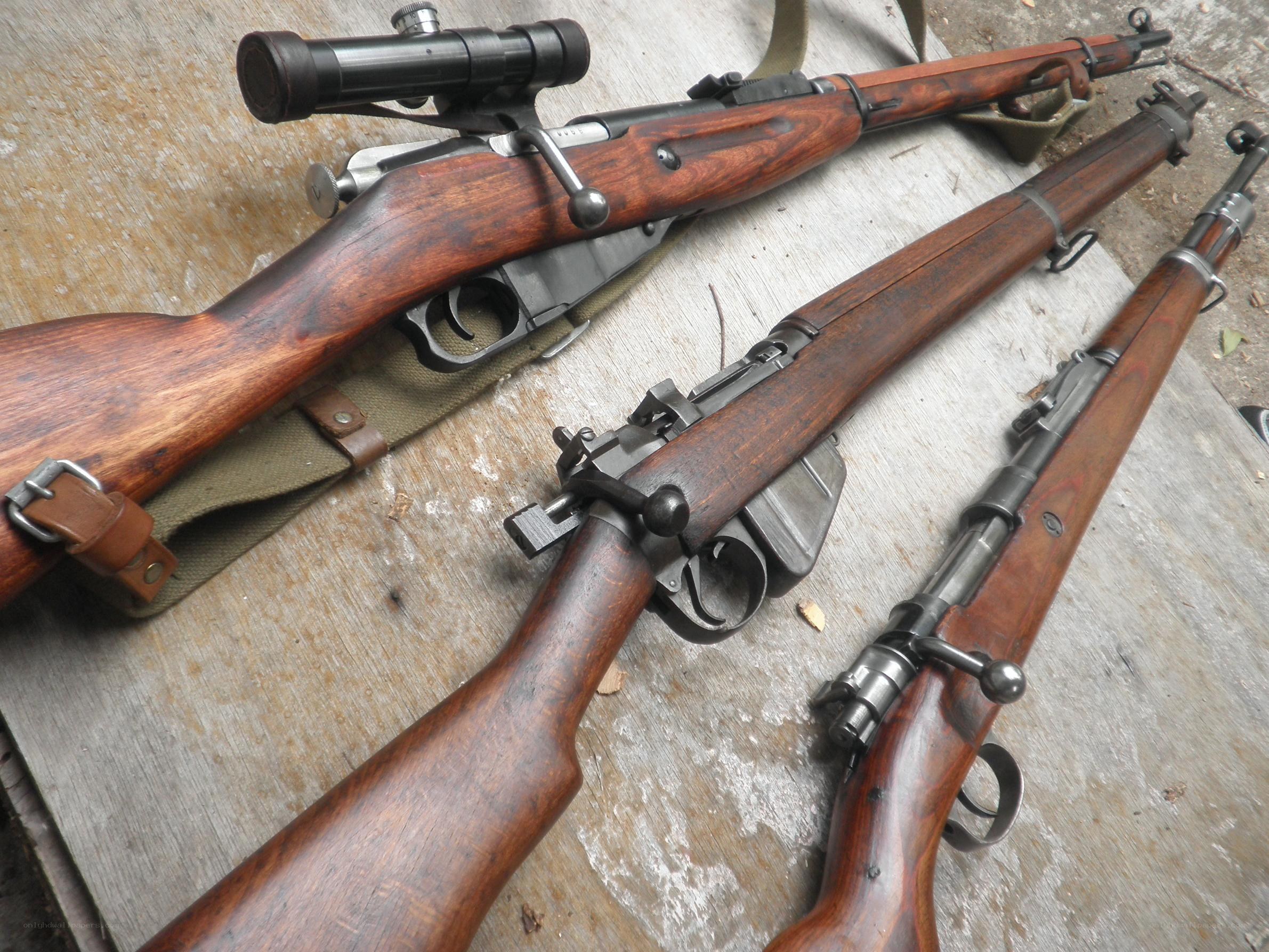 Three vintage bolt-action rifles