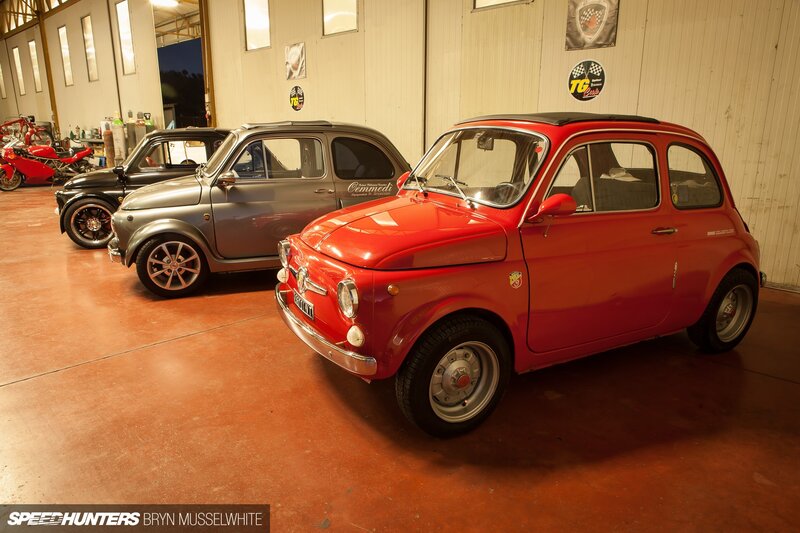 Three Vintage Cars in Garage