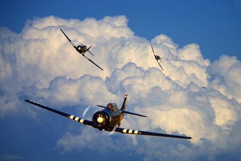 Three vintage warplanes in flight