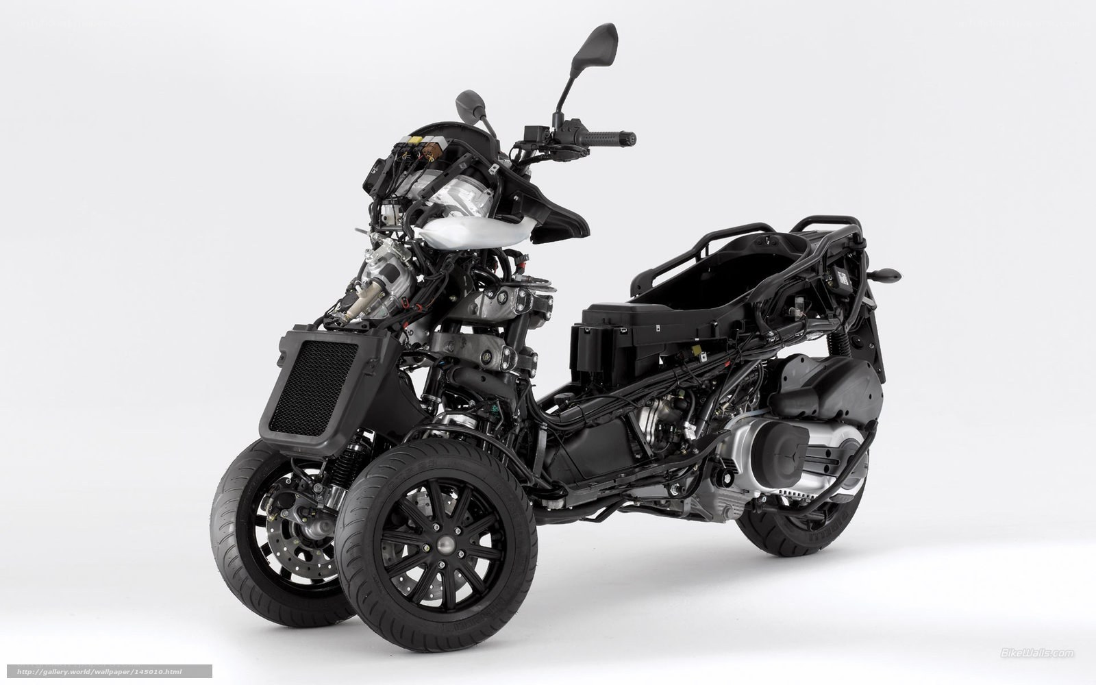 three-wheeled scooter engine view