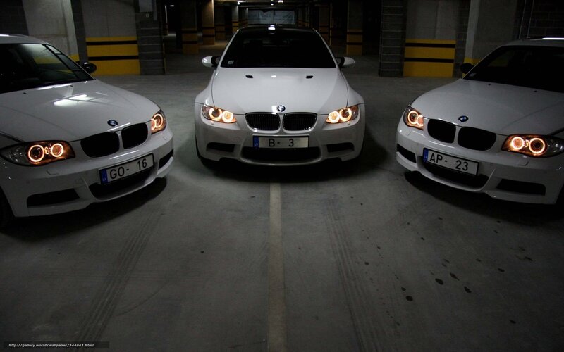 Three White BMW Cars