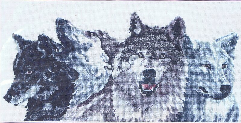 Three Wolves in Cross-stitch
