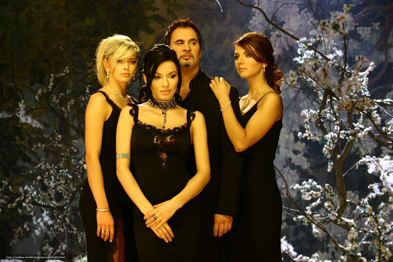 Three women and a man in black