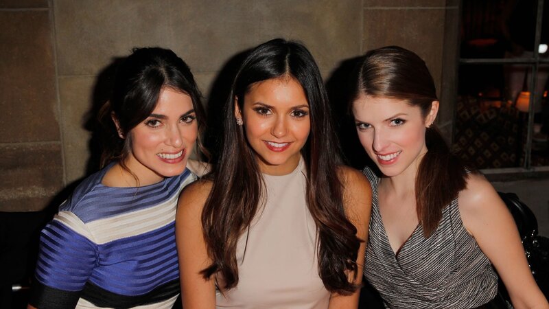 three women at an event