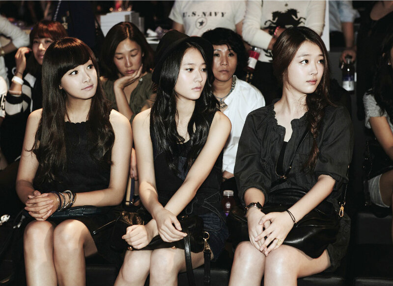 three women at fashion event