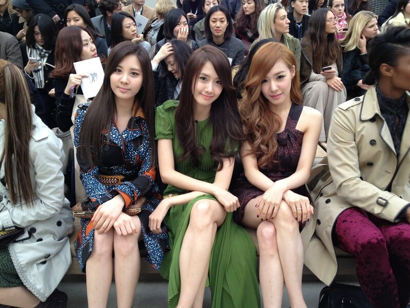 three women at fashion show