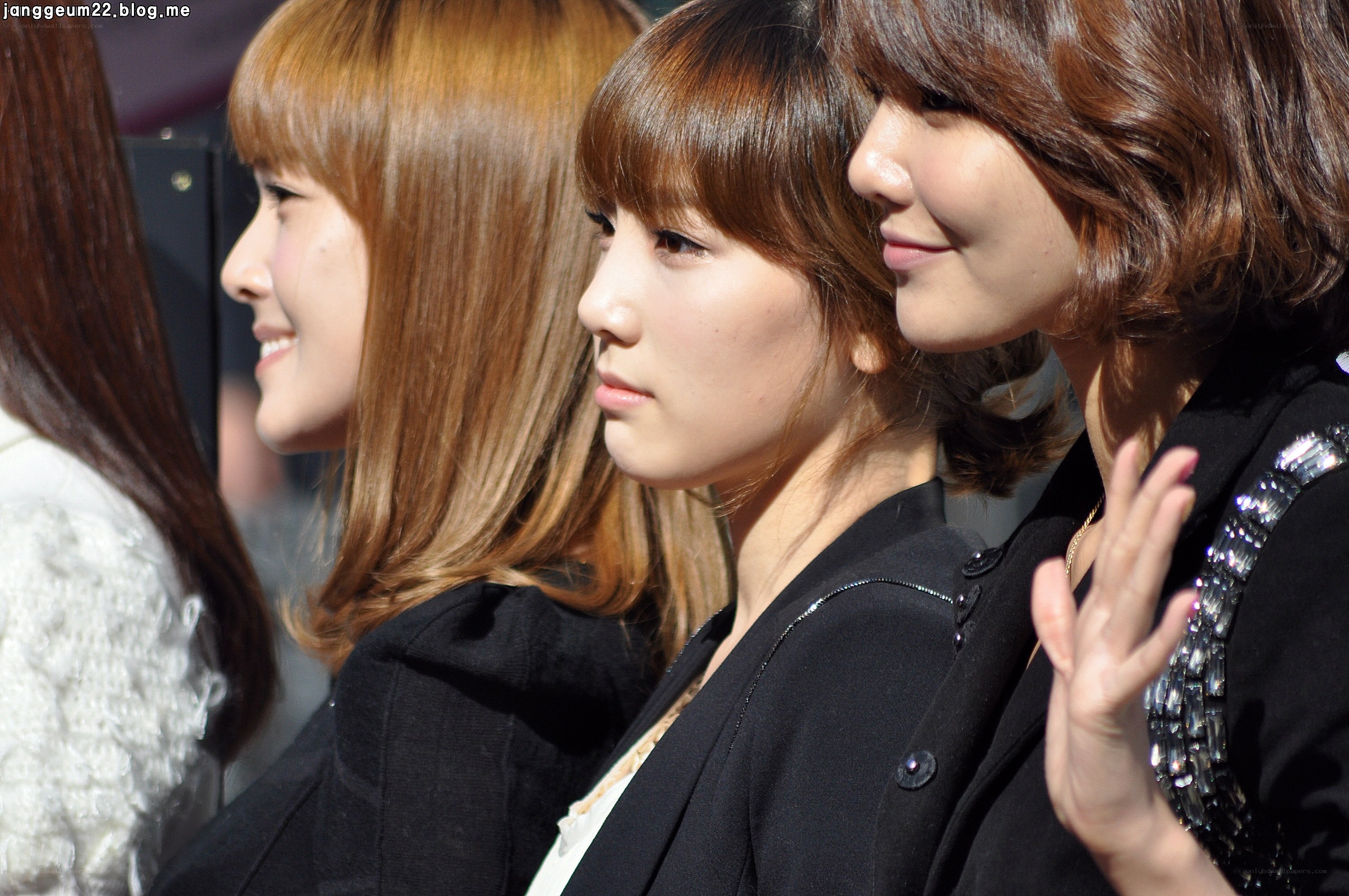 three women at public event