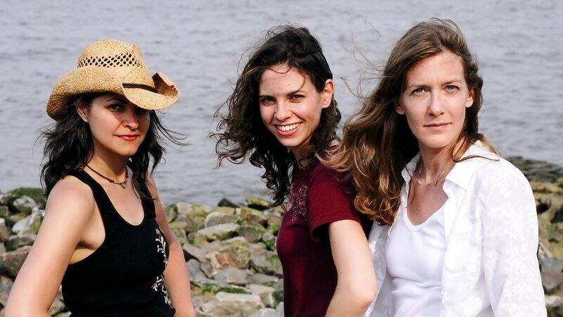 Three women by the water
