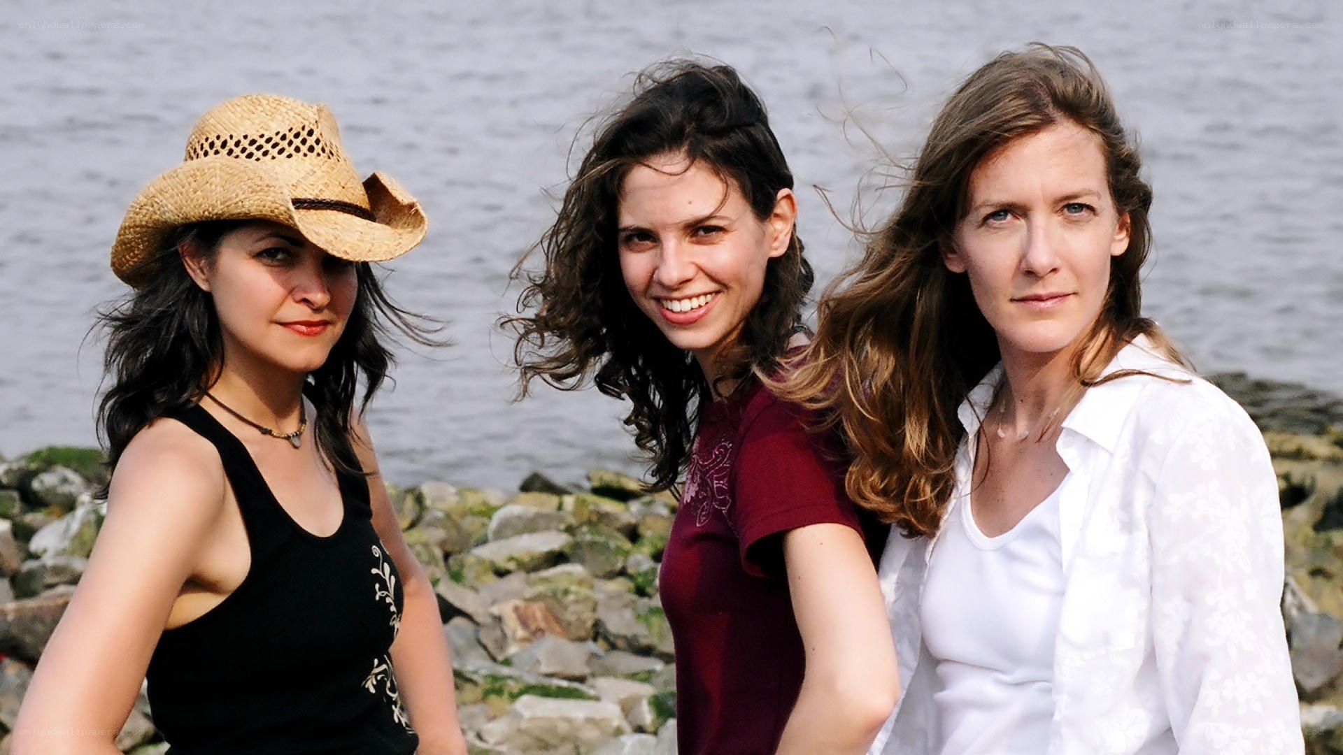Three women by the water