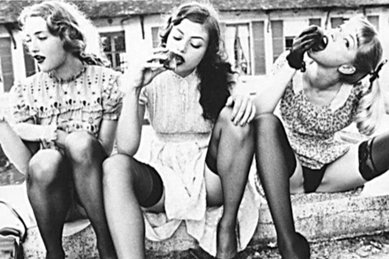 Three women eating outdoors