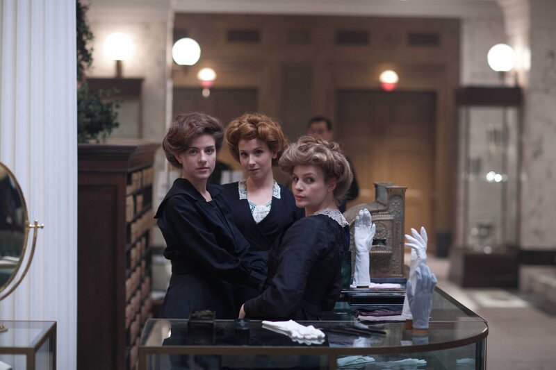 Three women in a vintage store