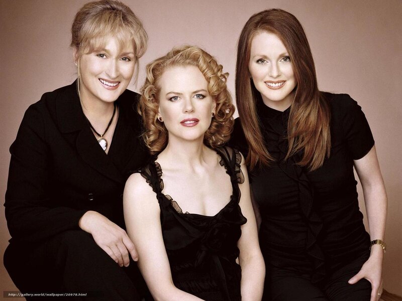 three women in black attire