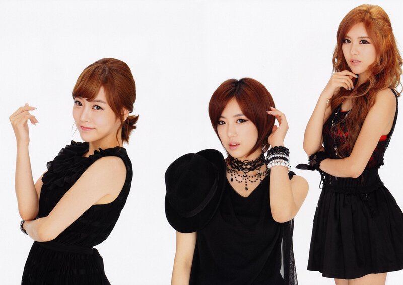 three women in black dresses