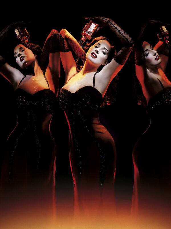 Three women in black dresses