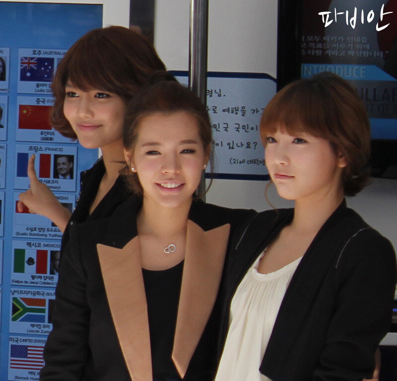 three women in black jackets