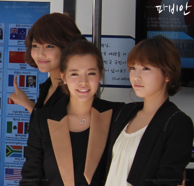 three women in black jackets
